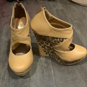 Tan leopard print wedges.